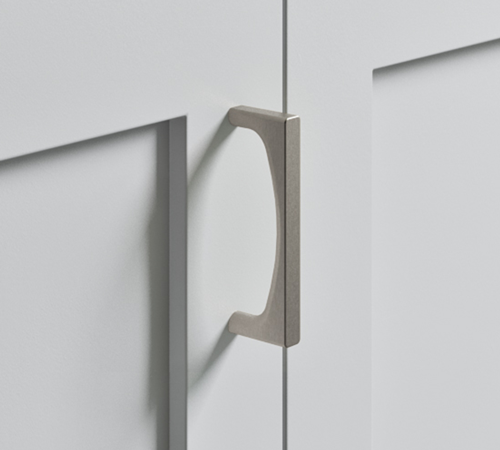 The Top Knobs Riverside pull in a Brushed Satin Nickel finish.